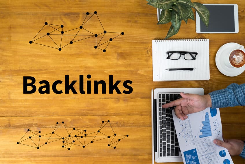What Are SEO Backlinks? | network of connected dots on wood table | www.b-seenontop.com