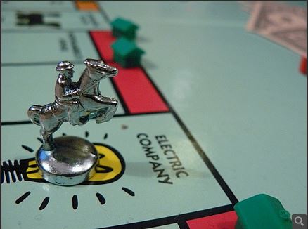 Monopoly game pieces signify the growth in competition on the Internet
