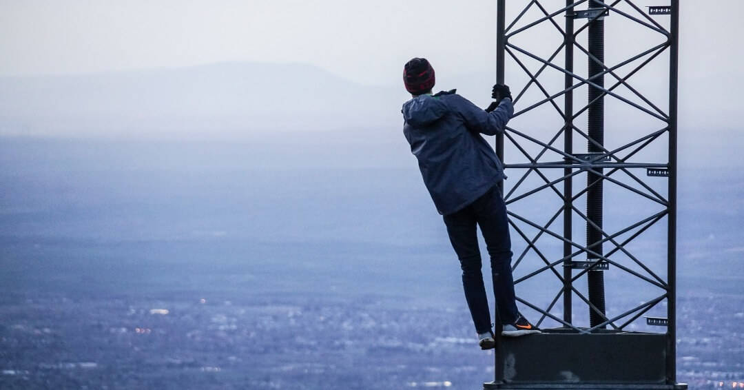 Why Isn't My Website Showing Up On Google | Man On Tower Looking Out Over City | www.b-seenontop.com